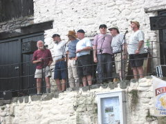 Singing at Clovelly Maritime Festival 'July 08. On the 'ledge'.